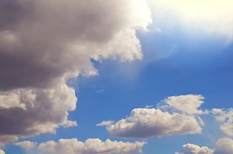 Nature background. Fluffy soft clouds in sky toned. Stock Illustration