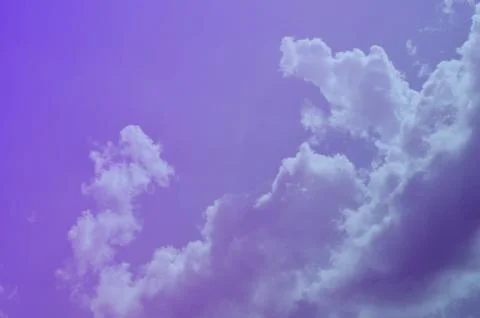 Nature background. Fluffy soft clouds in sky toned. Stock Illustration