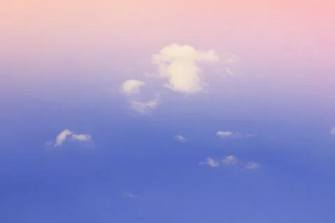 Nature background. Fluffy soft clouds in sky toned. Stockillustratie