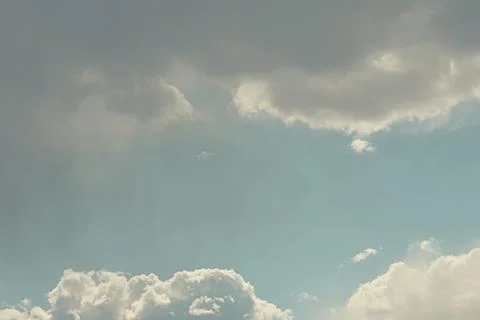 Nature background. Fluffy soft clouds in sky toned. Stock Illustration