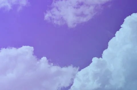 Nature background. Fluffy soft clouds in sky toned. Stockillustratie