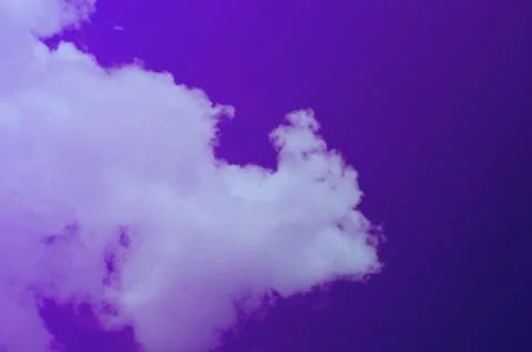 Nature background. Fluffy soft clouds in sky toned. Stock Photos