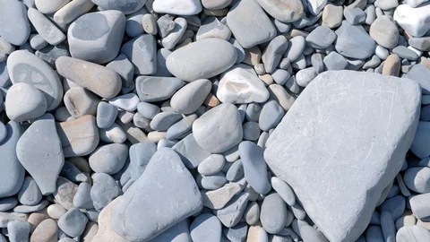 Nature background with grey big and small sea pebbles stones. Stock Footage 116177631