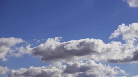A nature background. white clouds over blue sky Stock Photos