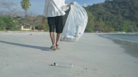 Nature conservation concept of 4k Resolution. Asian women collecting trash to Stock Footage 159372241