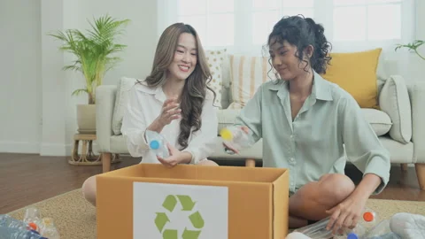 Nature conservation concept of 4k Resolution. Asian women collecting garbage  Stock Footage 194832793