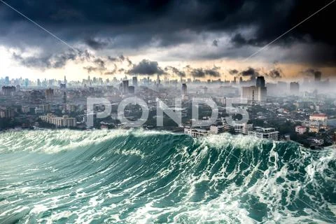 Nature disaster city destroyed by Tsunami waves Stock Photos