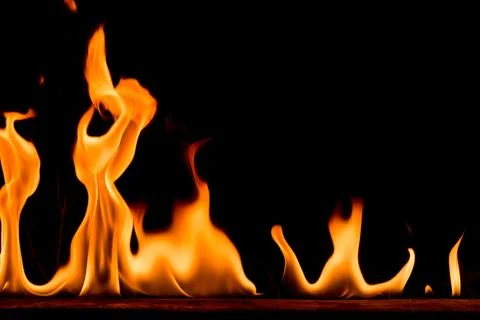 Nature Fire flames on black background. Freeze motion of Red-Yellow fire fl.. Stock Photos