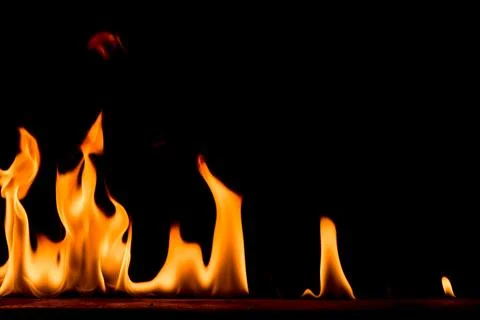 Nature Fire flames on black background. Freeze motion of Red-Yellow fire fl.. Stock Photos