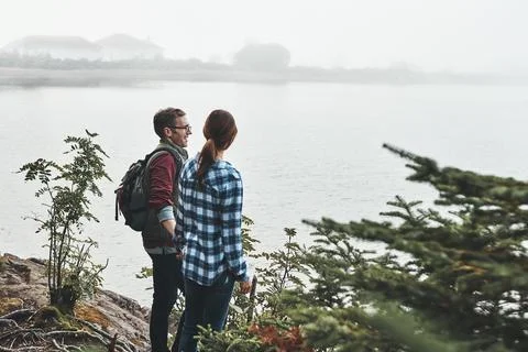 Nature is full of beautiful things to explore. a young couple exploring nature Stockfoto's