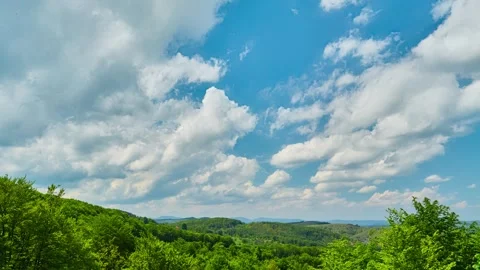 Nature landscape clouds rolling over hills and mountains time-lapse Stock Footage 312165500