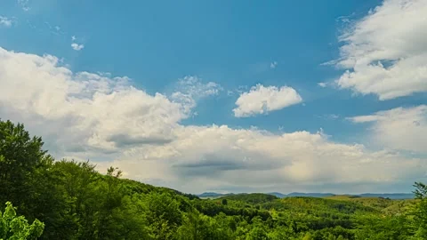 Nature landscape clouds rolling over hills and mountains time-lapse Stock Footage 312812822