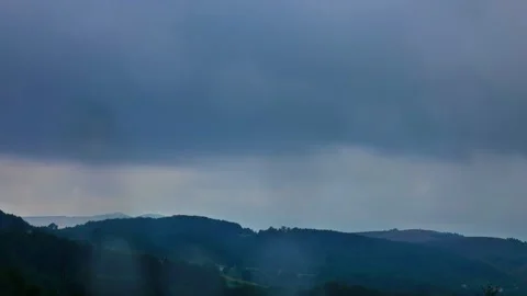 Nature landscape cumulus clouds rolling over hills and mountains time-lapse Stock-Footage 247082714
