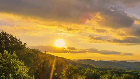 Nature landscape dramatic sunset over hills and mountains time-lapse Stock Footage 312811098