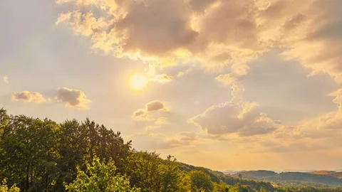 Nature landscape dramatic sunset over hills and mountains time-lapse Stock Footage 312813886