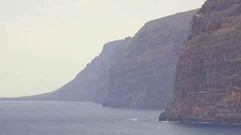 Nature landscape ocean waves rocky coast sunset Tenerife Canary islands. 스톡 동영상 105773003