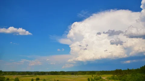 Nature landscape stormy clouds on sky rolling over countryside time-lapse Stock Footage 109360445