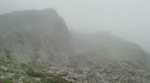 Nature landscape timelapse, stormy clouds floods on High Mountains rock 스톡 동영상 65763843