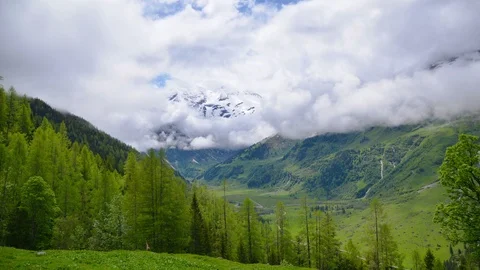 Nature mountain Alpine summer landscape with rolling clouds time-lapse. 스톡 동영상 106246765
