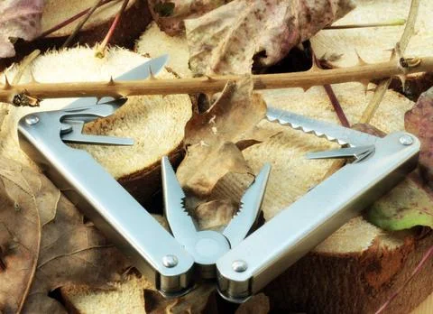In the nature Multi purpose scissors in natural environment. Survive in wi... Foto stock