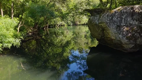 Nature Reflections Over Deza River Near Taboada Bridge 動画素材 337775909