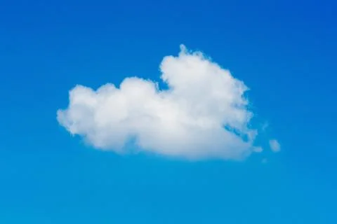 Nature single white cloud on blue sky background in daytime Stock Photos