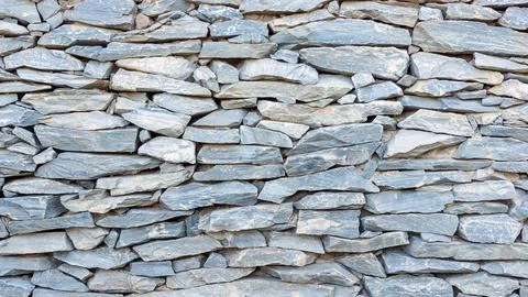 Nature stone wall for a background. Stock Photos