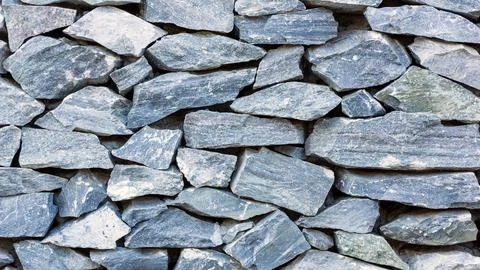 Nature stone wall for a background. Stock Photos