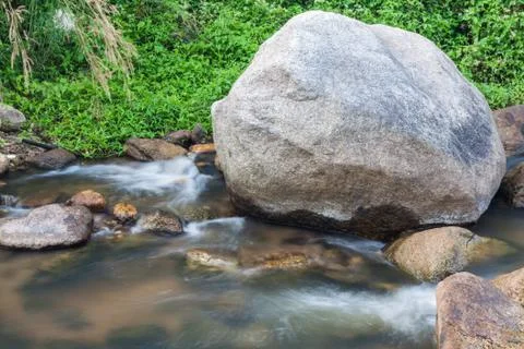 Nature stream with rock Stock Photos