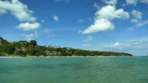 Nature with tropical sea and beach on white cloud and blue sky Video stock 98599853