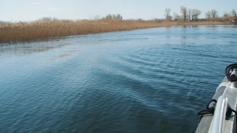 Nature view from a floating boat in the river in spring Video stock 105882213