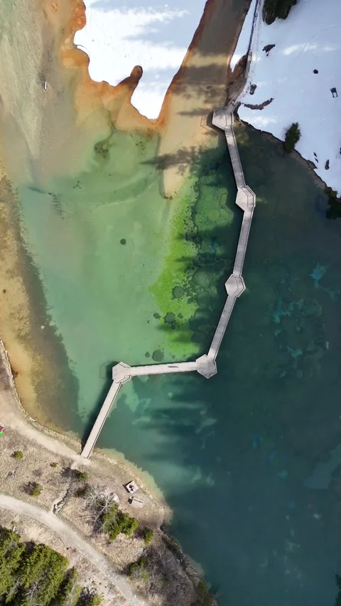 Nature view of lake Lac de la Rosiere by spring in Courchevel Stock Footage 334154188