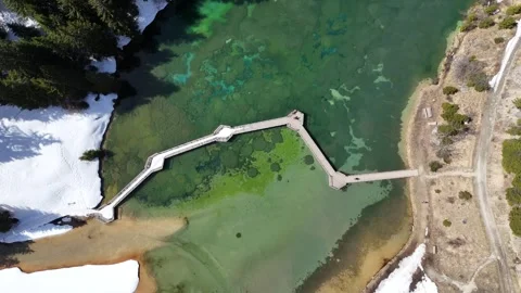 Nature view of lake Lac de la Rosiere by spring in Courchevel ski resort Stock Footage 334311338