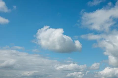 Nature view large white clouds on soft sky background Stock Photos
