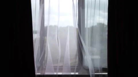 Nature view through the window. Easy swaying of tulle from the wind. Stock Footage 165845617