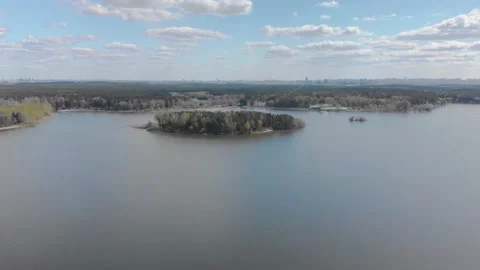 Nature views with lake, forest, field, clouds in a sunny day. Drone View. Video6 Stock Footage 131456792