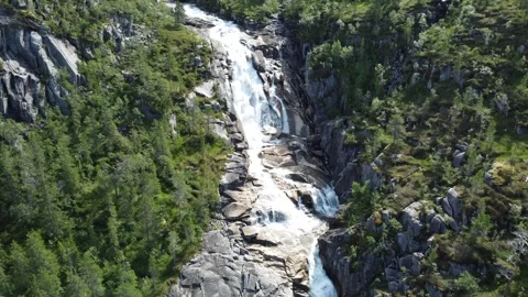 Nature water flow over rocks in mountain landscape during sunny day Stock Footage 327584273