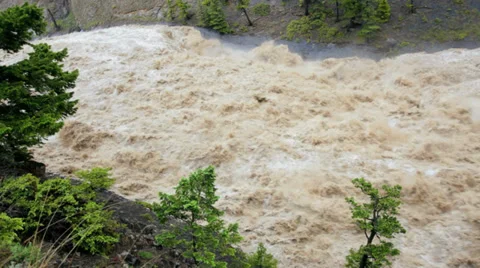 Natures storm fast flowing down flooded mountain river Stock Footage 29638944