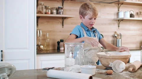 Naughty boy in kitchen making mess Stock Footage 60791271