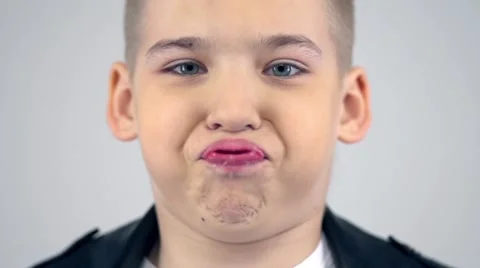 Naughty child making funny faces and having fun in slow motion Stock Footage 58966098