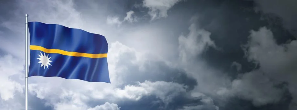 Nauru flag on a cloudy sky Illustrazione stock