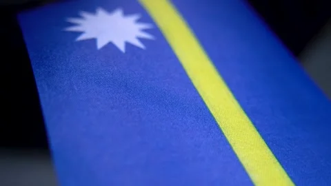 Nauru Flag Textile Background With Star Detail Stock Footage 329356374