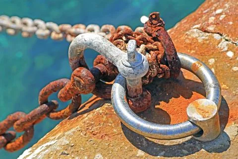 Nautical anchor chains on the pier Stock Photos