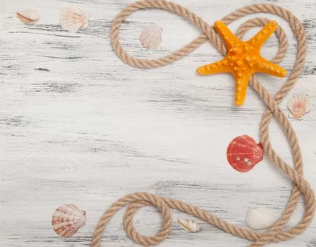 Nautical background with ropes, shells and starfish Stock Photos