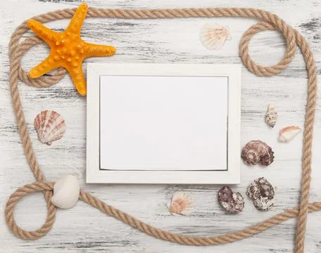 Nautical background with ropes, shells and starfish Stock Photos