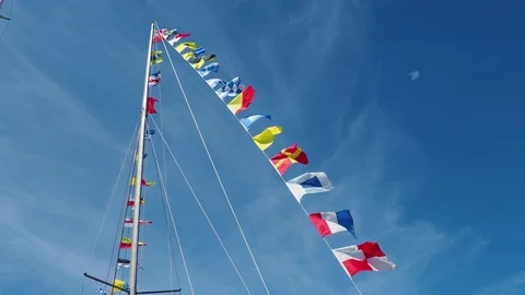 Nautical flags against blue sky Stock Footage 113350106