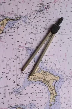 Nautical map with a bow compass Stock Photos