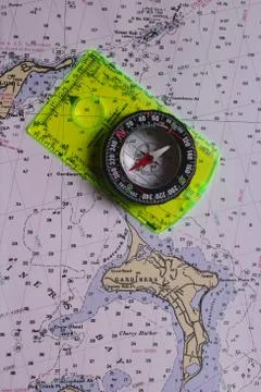 Nautical map with an orienteering compass Stock Photos