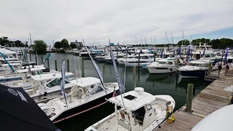 Nautical Showcase of Modern Yachts and Boats Docked at Harbor for Public Viewing Vídeo Stock 346651882