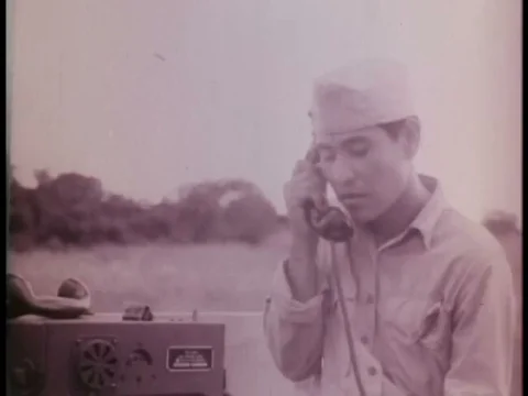 Navajo Indians use coded languages in World War II. Stock Footage 74776614